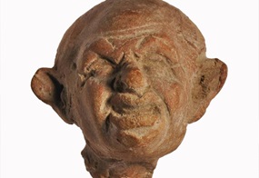 Das Terrakottaköpfchen eines «Dummkopfs » aus dem ptolemäischen Ägypten. London, British Museum.