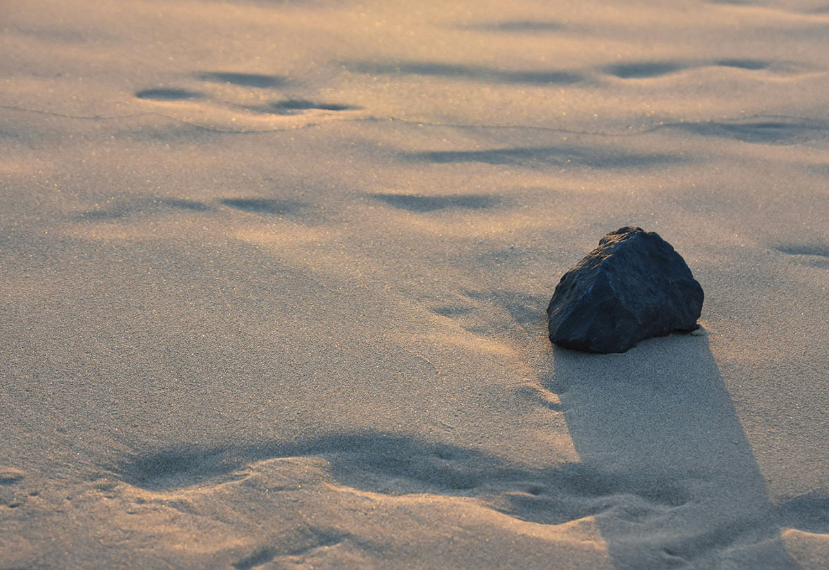 Stein im Sand